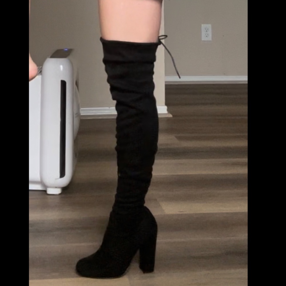 Black thigh high boots
